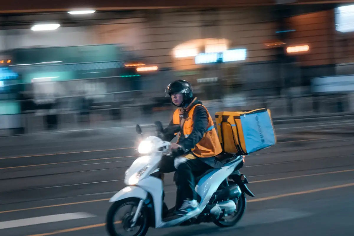 Delivery rider on a motorbike