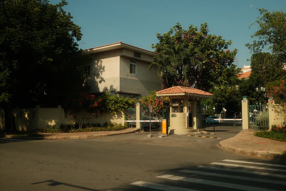 Estate entrance with guardhouse and barrier