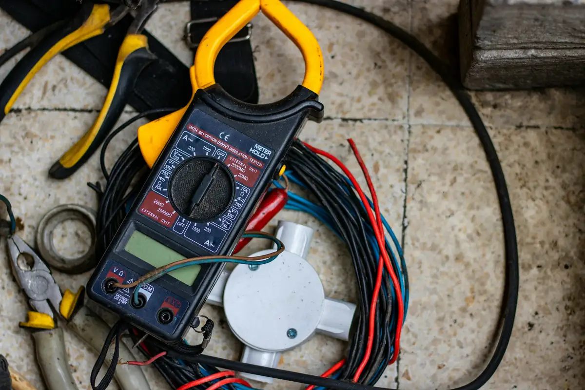 Electrician's multimeter and tools