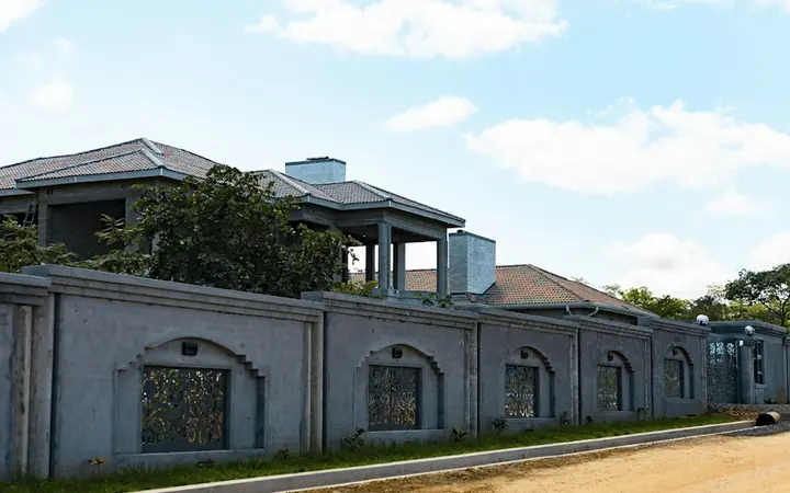 House behind a boundary wall